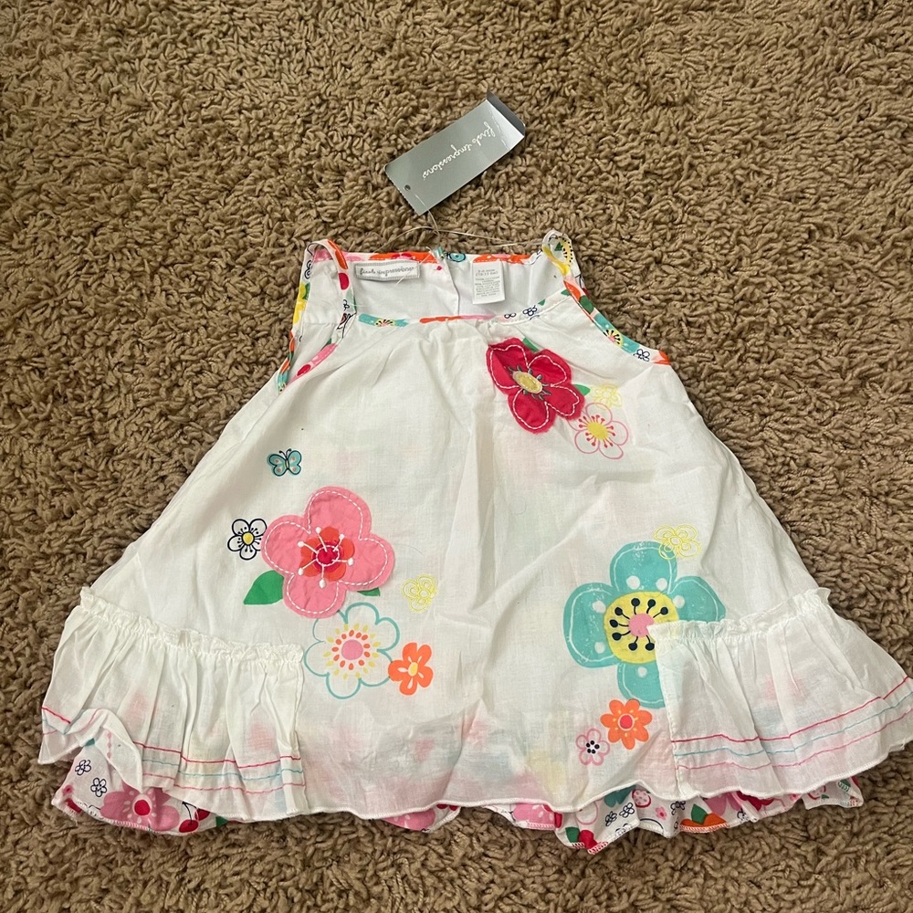 First Impressions White Dress with Vibrant Floral Design